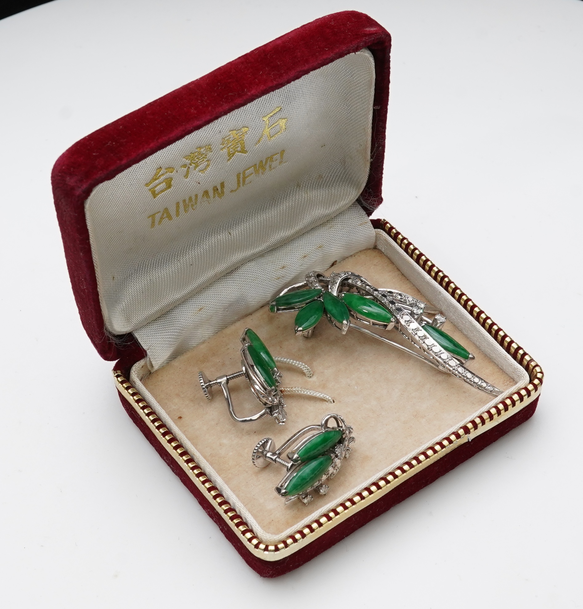 Chow Tai Fook, a jadeite and diamond demi-parure, 1960s